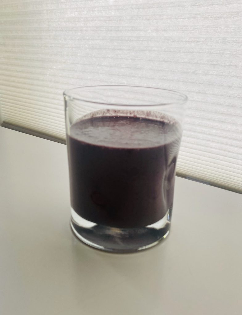 This is a picture of chocolate nut smoothie with PurePaleo Protein powder and other ingredients to increase your daily protein needs for body repair and recovery.