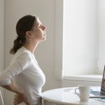 Why Does My Back Hurt When Sitting? Tips for People in Edmonton